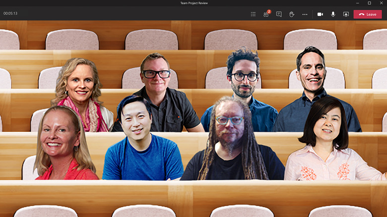 Microsoft Zoom together mode shown with eight participants in an auditorium