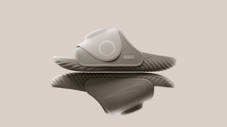 A Nike Air Zoom Hyperslide on top of another.