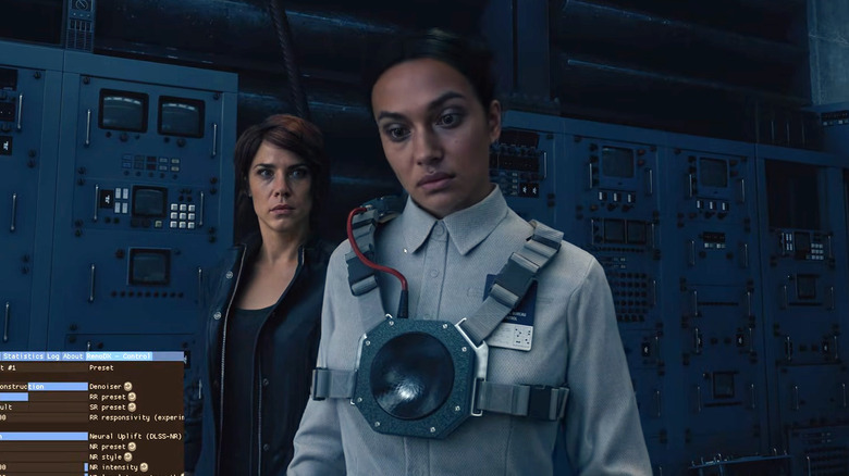 A scene from Control, featuring Jesse Faden and an NPC, using AI upscaling tech