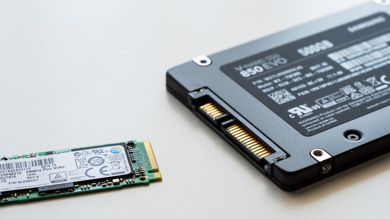 An NVMe SSD and a SATA SSD side-by-side.