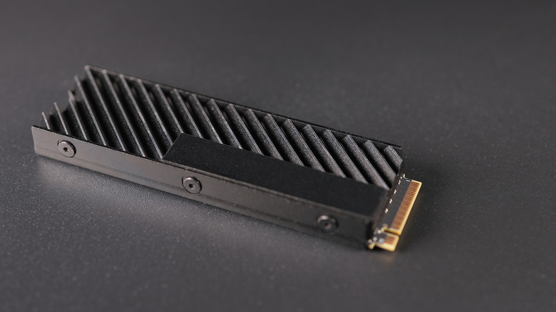A high-performance NVMe SSD with heatsink installed.