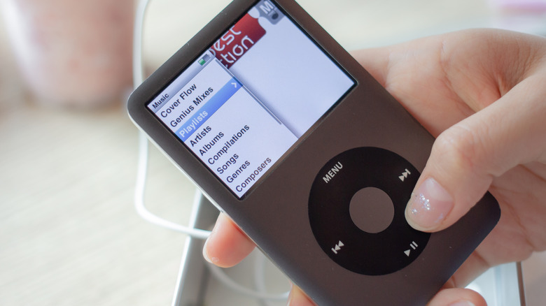 Person navigating iPod Classic menus