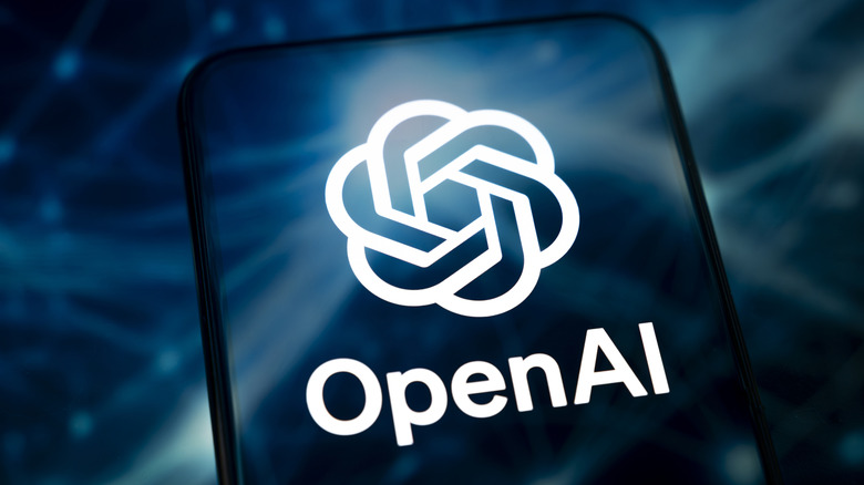 OpenAI name and logo displayed on phone with blue background.