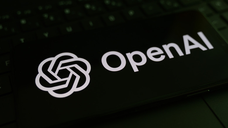 The OpenAI logo on a laptop.