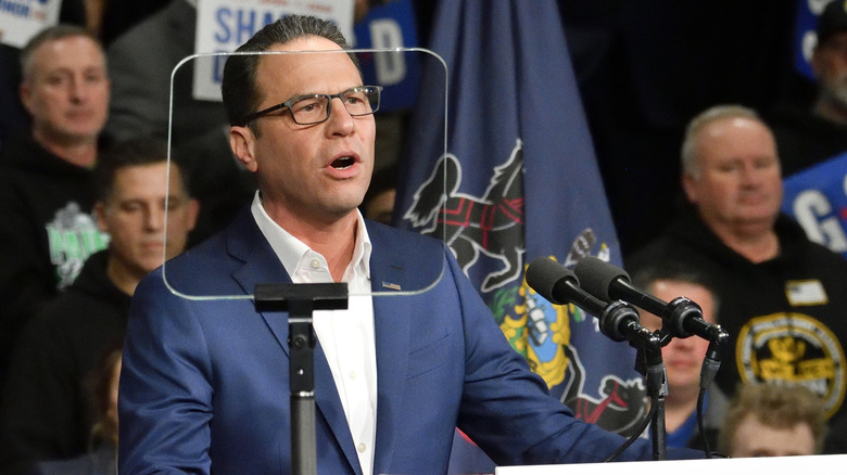 Pennsylvania Governor Josh Shapiro speaking at a rally.