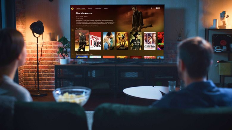 The Plex app open on a TV in a living room.