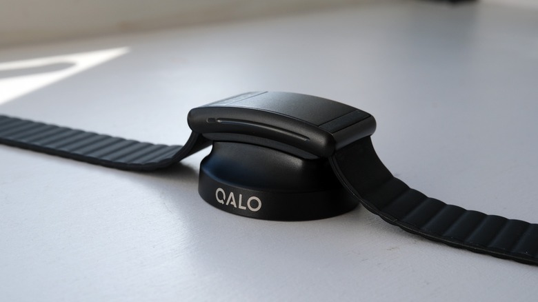 QALO SL-1 on its charging base.