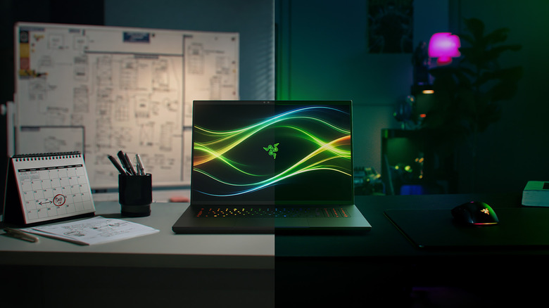 Razer Blade 18 laptop sitting on a desk (dramatic gamer lighting)