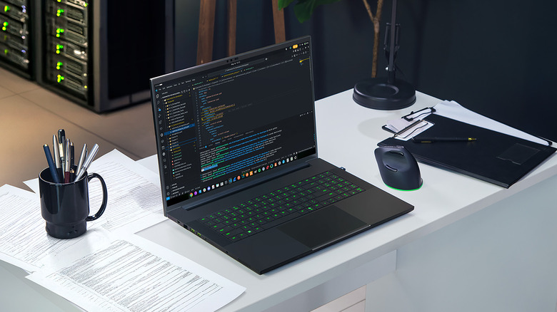 Razer Blade 18 laptop, sitting on a desk
