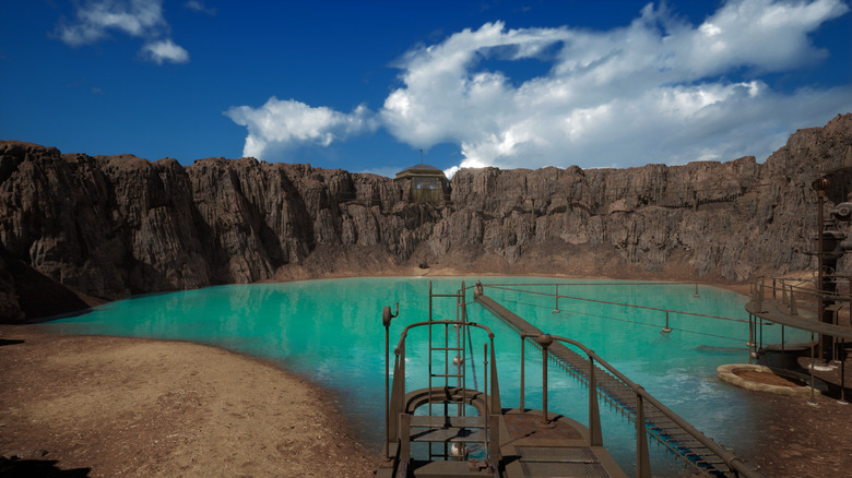 A metal platform over a reservoir from the game Myst.