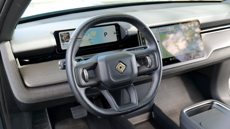 The steering wheel and driver's display on the Rivian R2.