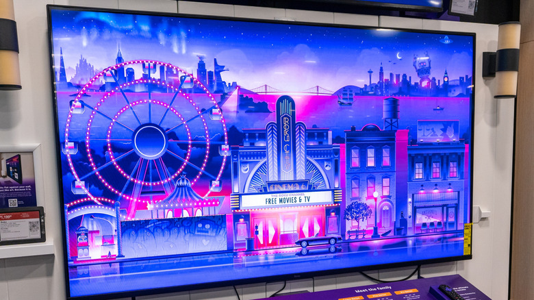 A Roku TV on display at an electronics shop.