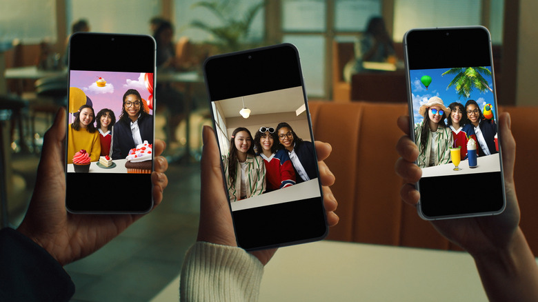 Three hands holding up Samsung Galaxy S25 FE phones showing photos.
