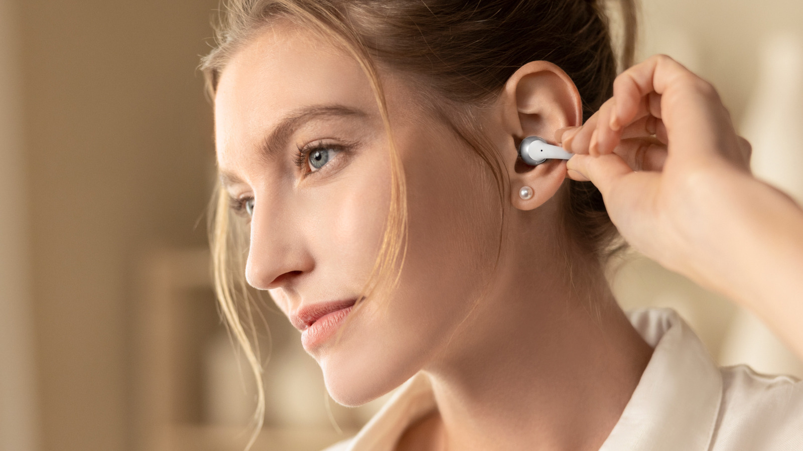 Shokz says its clip-on OpenDots 2 earbuds focus on improved volume and bass