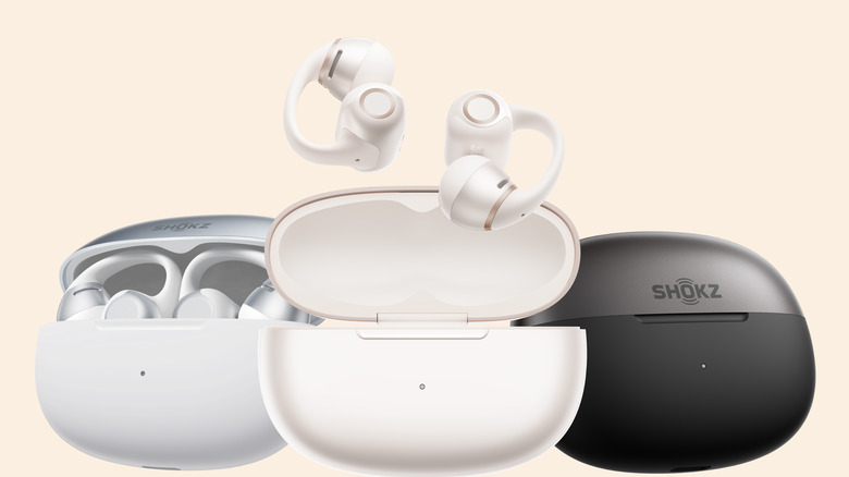 Three pairs of Shokz OpenDots 2 earbuds (with charging cases)
