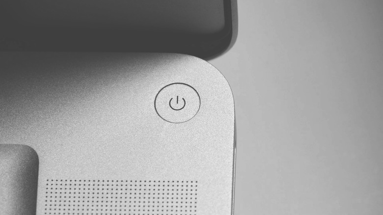 The power button on a laptop.