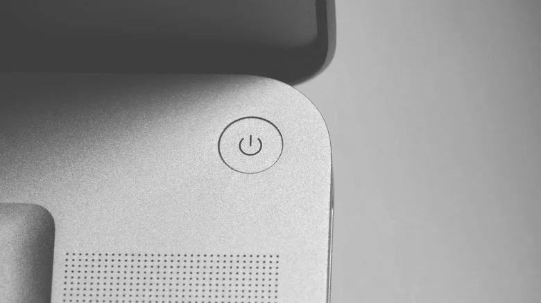 The power button on a laptop.