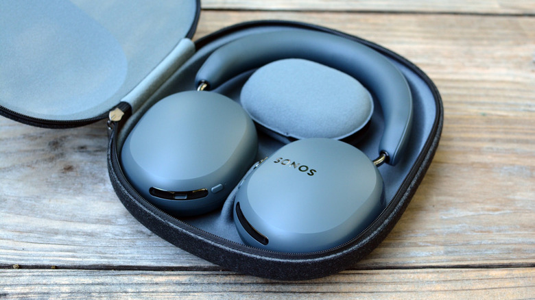 Sonos Ace Ultra in their case.