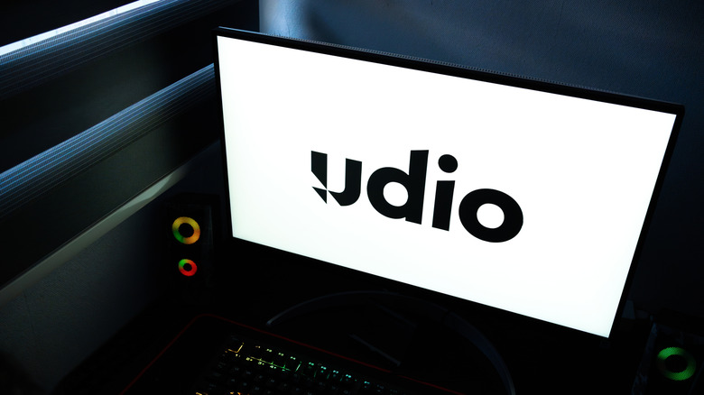 Logo of Udio on a laptop.