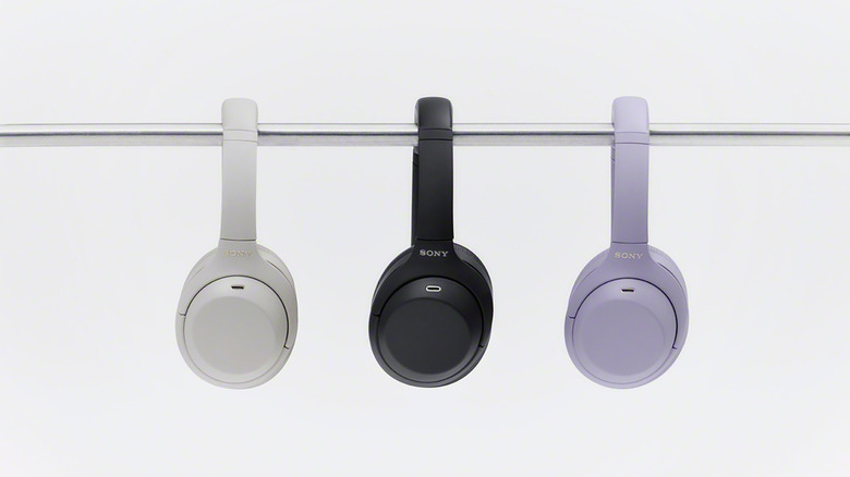 Sony's WH-1000XM4C (2nd gen) headphones in tan, black and purple.