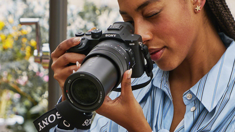 Sony's RX10 V superzoom compact camera is shown from the front with the lens extended