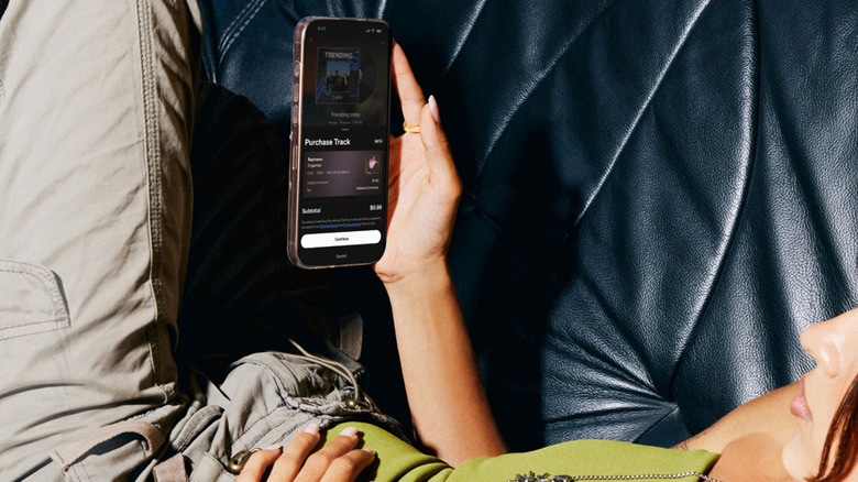 A woman prepares to purchase from a SoundCloud artist.