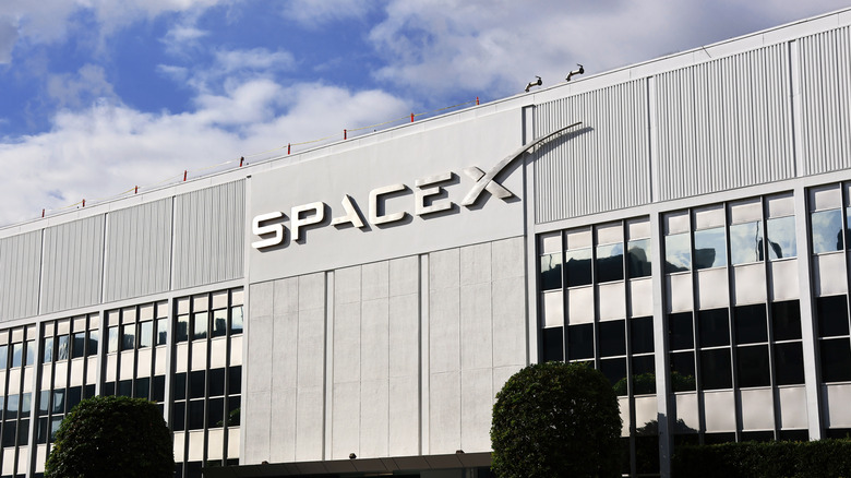 The SpaceX logo on the side of an office building.