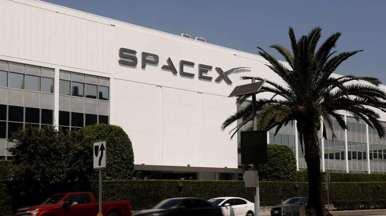 The SpaceX logo as seen on the facade of the one of the company's facilities.