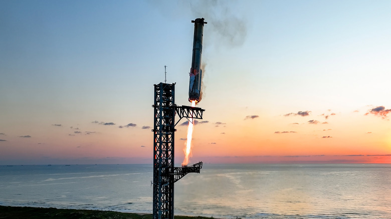 SpaceX shown capturing its Starship main rocket from its tower aparatus