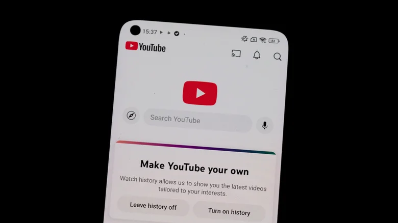 A phone screen showing the YouTube app, with options to leave history off or turn on history.