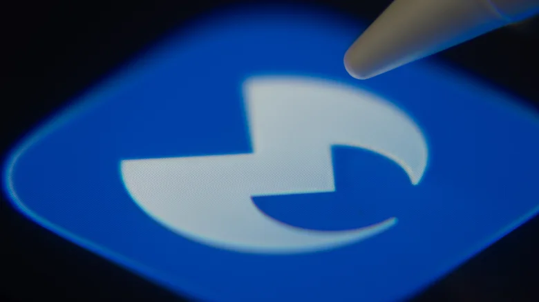 A stylus touching the Malwarebytes app icon.
