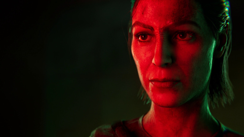 A still from Star Trek: Shadow Frontier showing a closeup of Ro Laren illuminated by red light