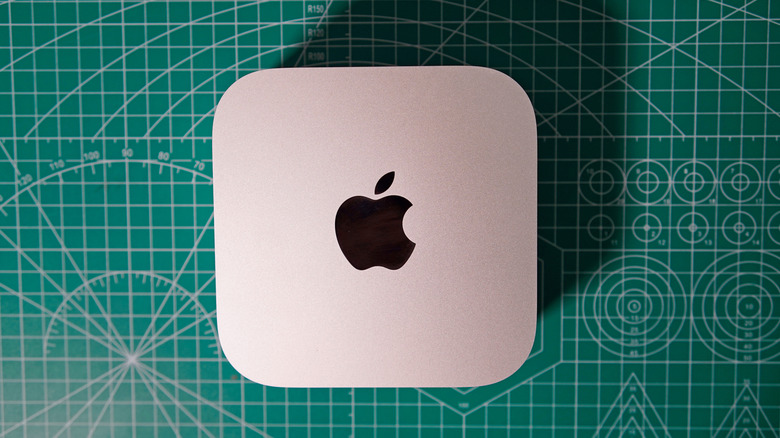 A Mac mini on a table.