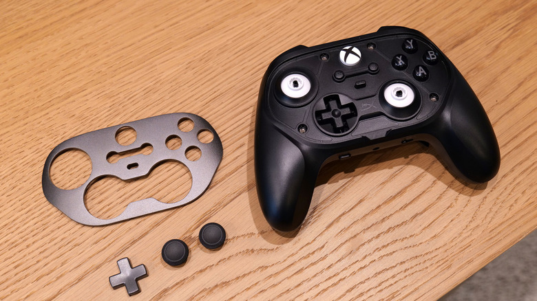 Similar to Microsoft's Elite Controller, the Clutch Talon comes with a bunch of extra components like analog sticks and triggers.
