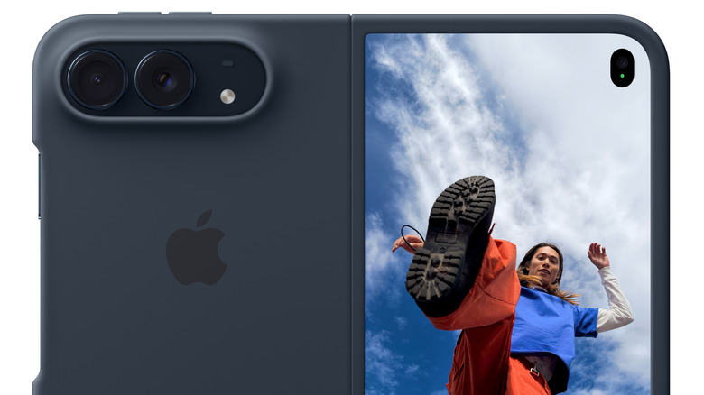 The outside of a fully-open iPhone Duo clad in Apple's Navy Blue case.
