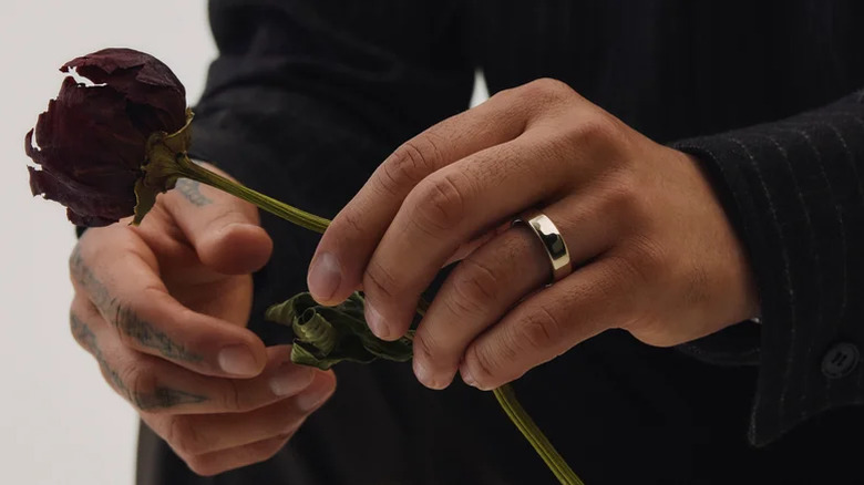 Oura's new Ring on a model.