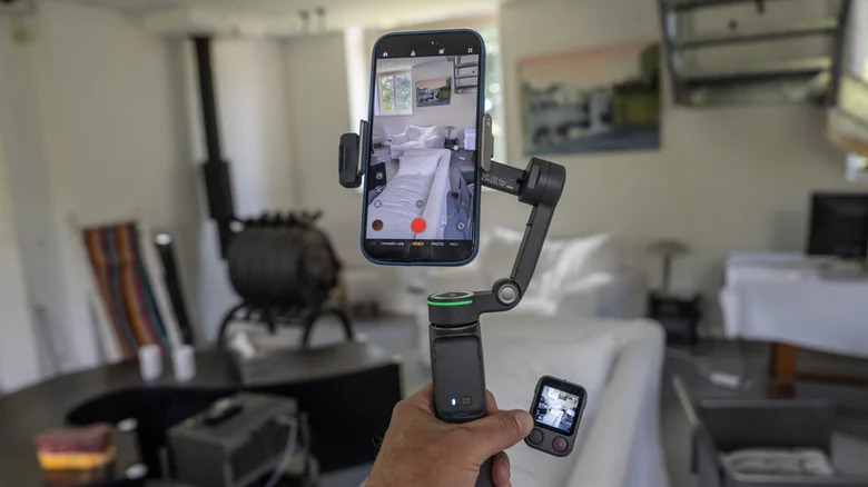 DJI's Osmo Mobile 8P gimbal recording a room.