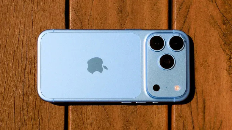 A Glacier iPhone 18 Pro lying on a wooden surface