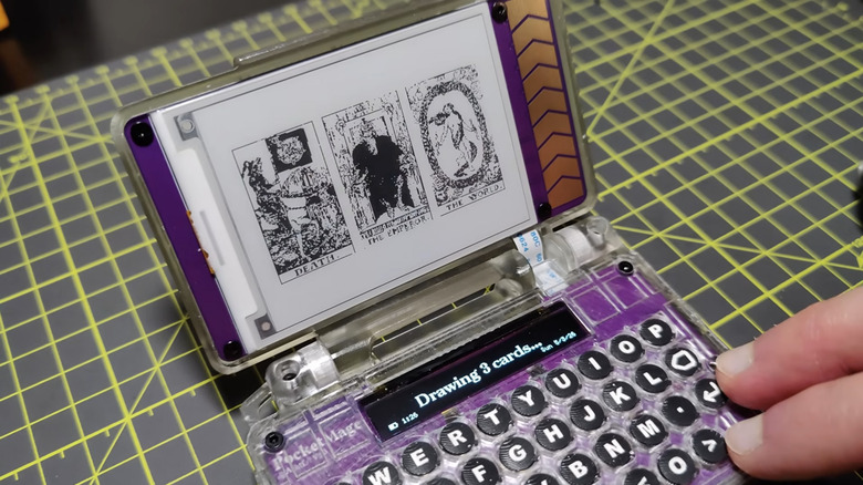 A PDA showing digital tarot cards.