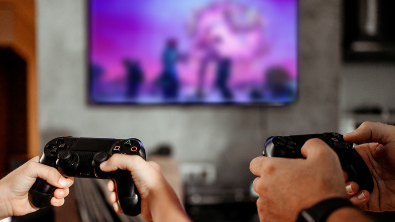 Playing games on a big screen.