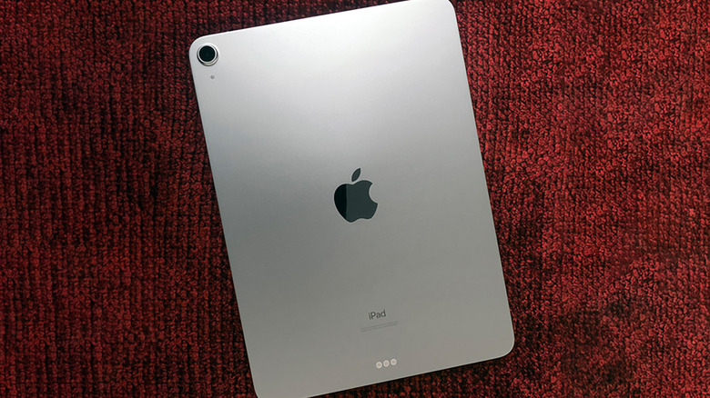 An iPad Air (2020), sitting face-down on a desk