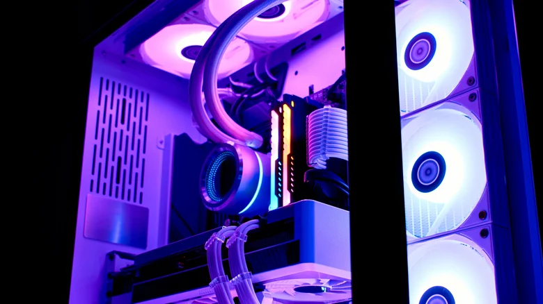 A close-up of a gaming PC with liquid cooling and RGB lighting.