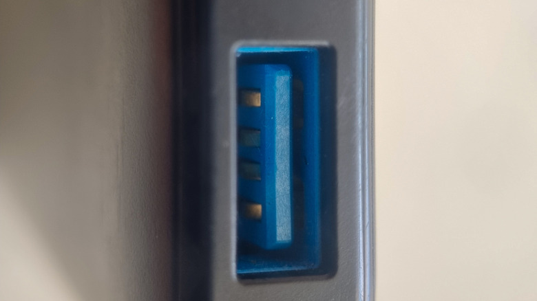 Close-up of a blue USB-A port.
