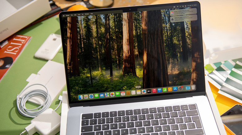 MacBook Air M4 on a cluttered desk