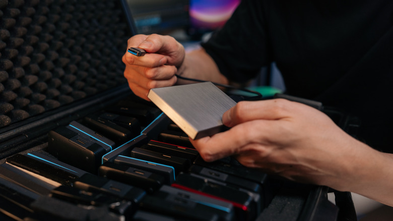 A case full of external SSDs.