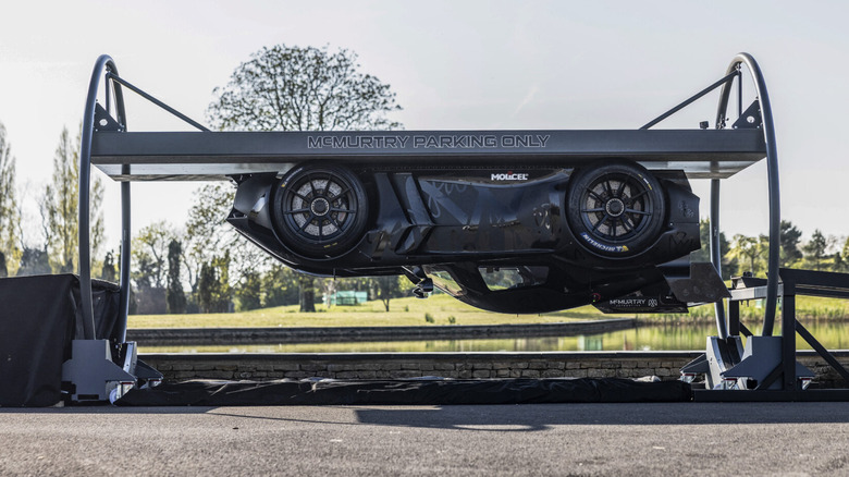 A McMurtry Spéirling car suspended upside down.