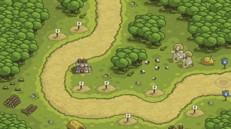 Screenshot of 2D animated game Kingdom Rush, featuring a path through a forest.