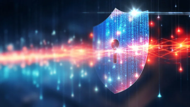 Shield with a keyhole on a dark background.