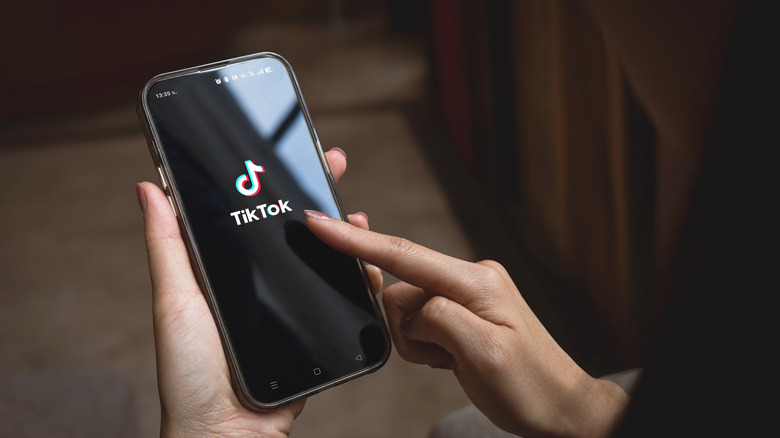 TikTok logo on a phone.