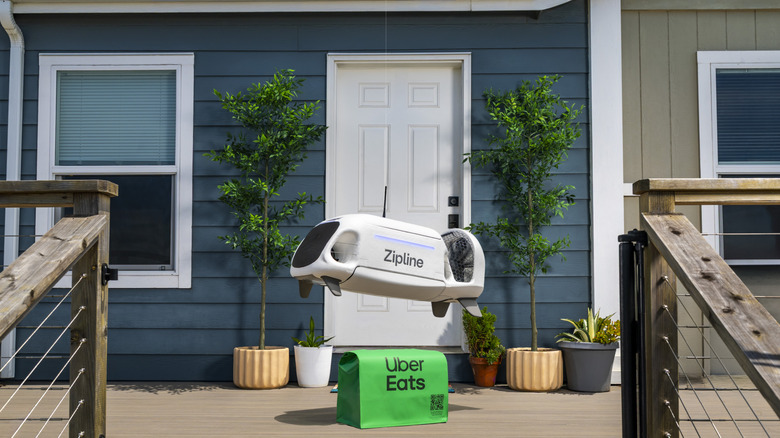 A Zipline drone delivering an Uber Eats order.